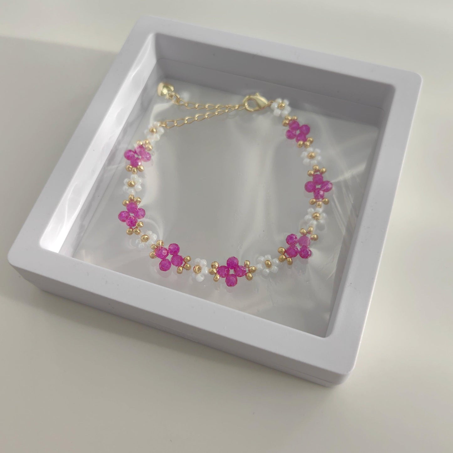 white-beads-bracelet-with-red-crystals