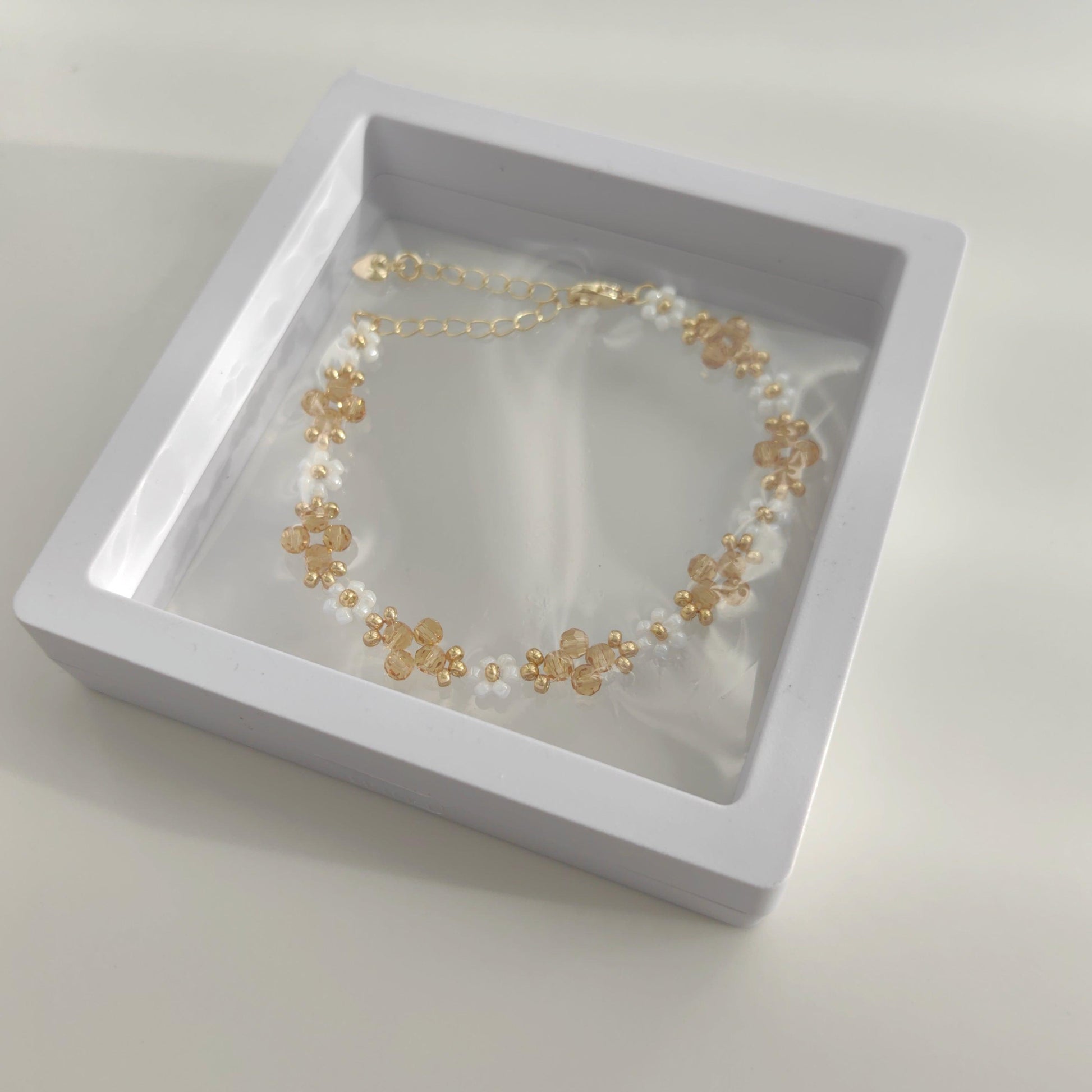 white-beaded-handmade-bracelet-with-yellow-crystal
