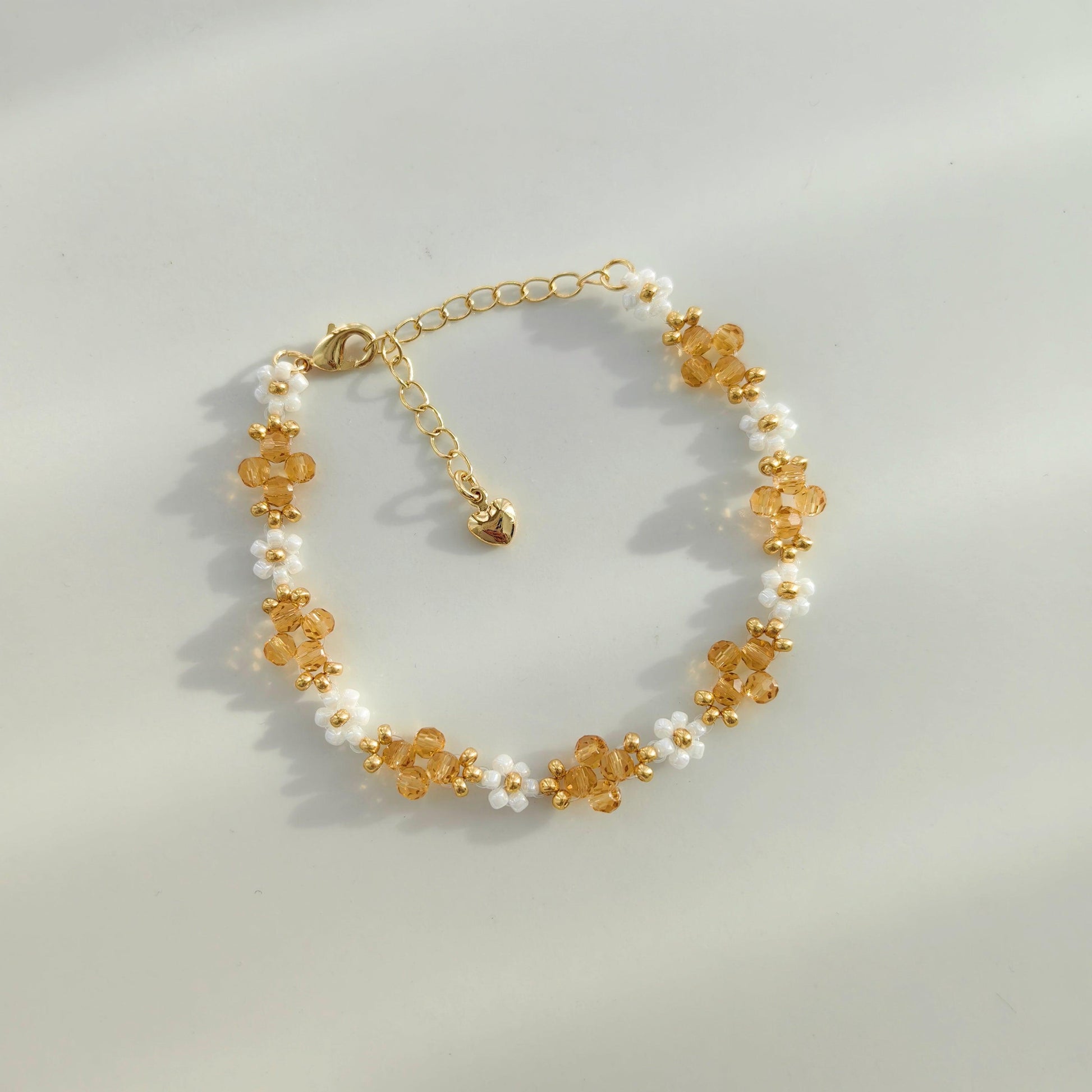 white-beads-handmade-bracelet-with-yellow-crystals
